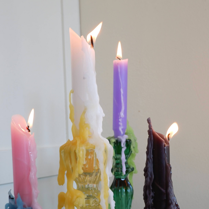 melting candles in bottles